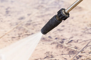 Outdoor floor cleaning with high pressure water